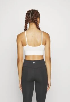 Sujetadores Deportivos Con Sujeción Ligera - Off-White -ASOS TIENDA 55a47a9a25bb4937bba9d2cc40613170